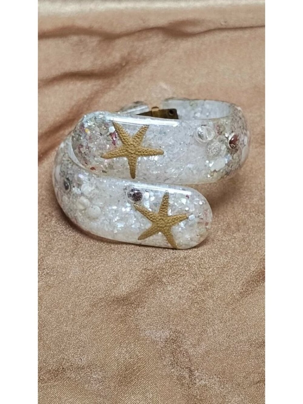 MCM Lucite Hinged Clamper Glitter Bracelet With Embedded Starfish.